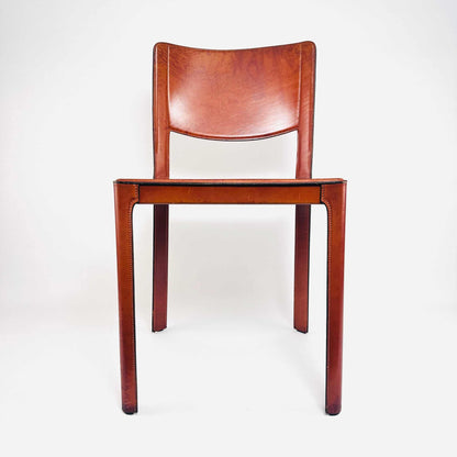 Frontale Gesamtansicht des Tito-Agnoli-Sistina-Stuhls aus rotbraunem Leder für Matteo Grassi, 1980er