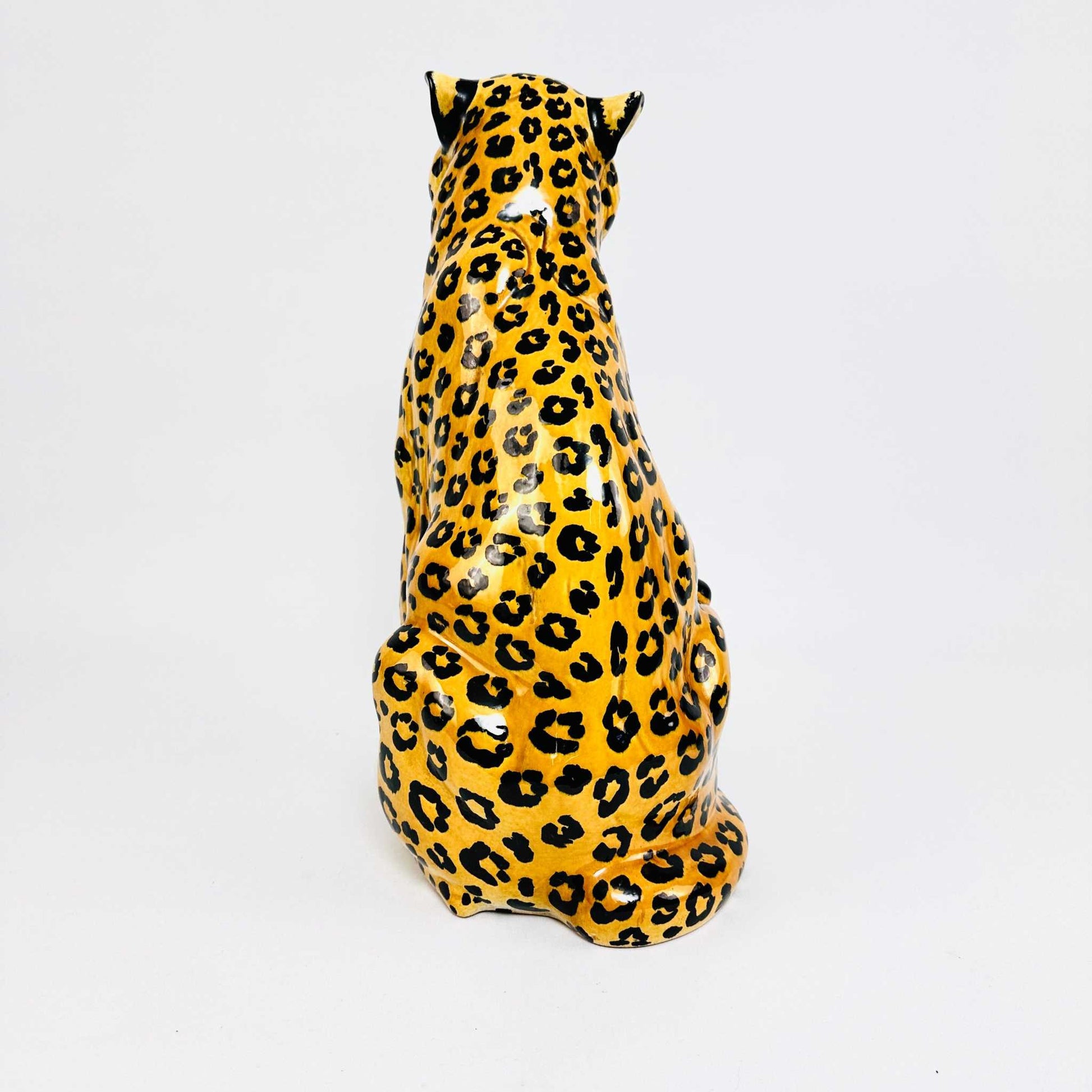 Vintage 1960s Italian ceramic leopard sculpture with stylized rosettes and signature