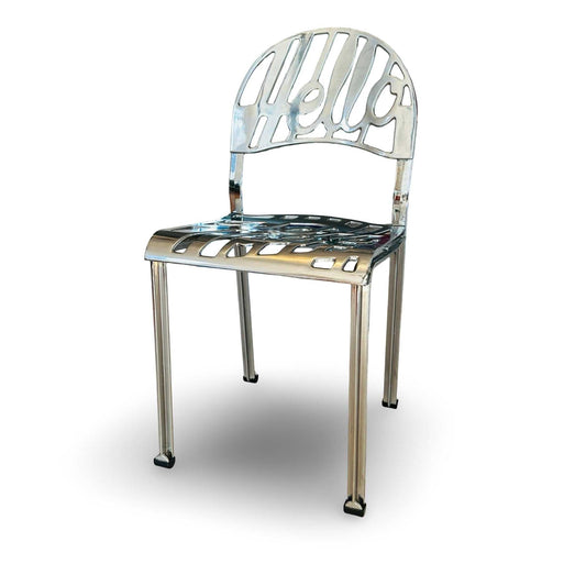 Artifort Hello There Chair verchromt von 1978 mit ausgeschnittener Schrift auf Rückenlehne und Sitzfläche, ikonisches Pop-Art-Design aus Aluminium