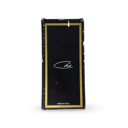 Boîte d’origine du décapsuleur, noire à cadre doré, logo calligraphié Carl et mention Made in Italy