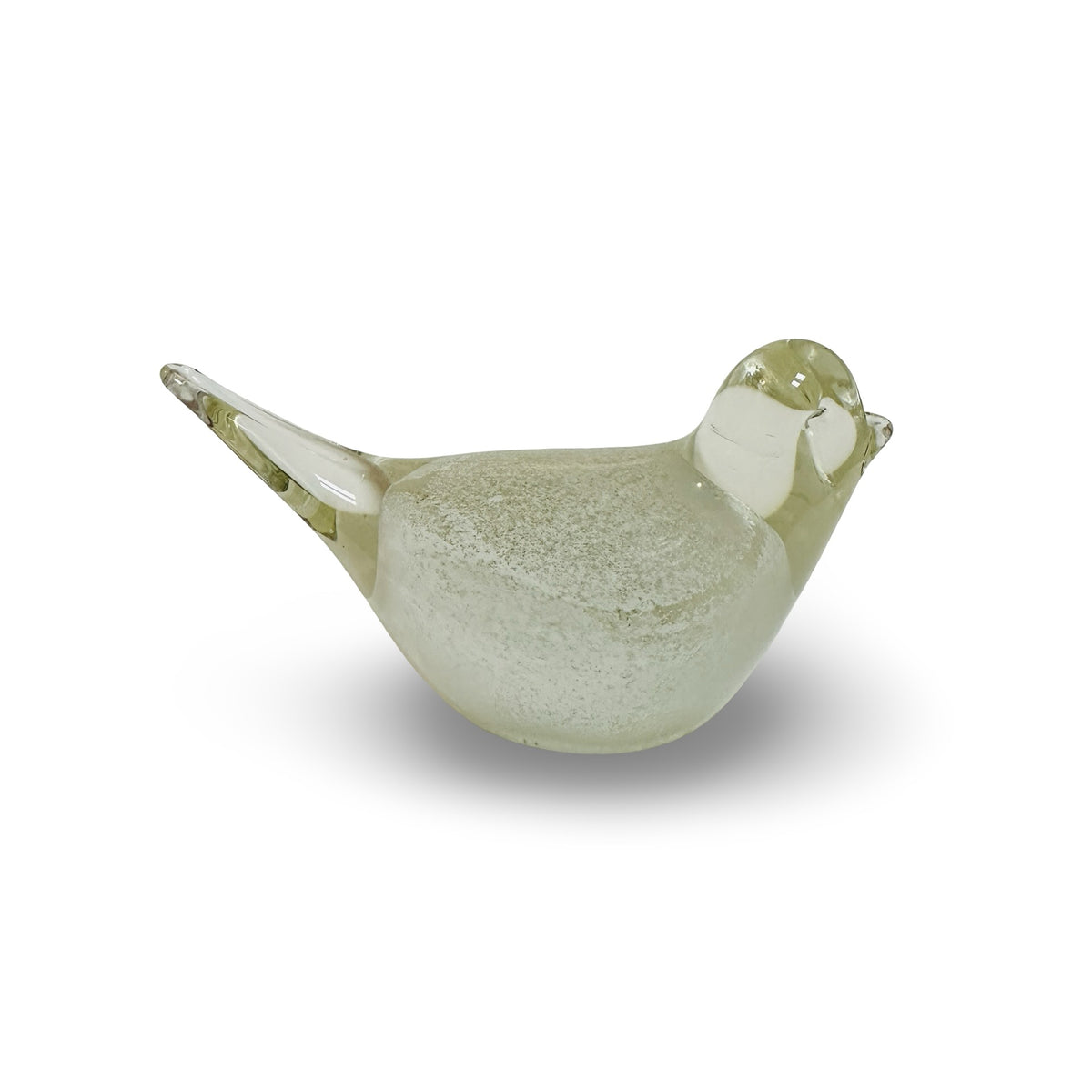 Single glass bird in side view with clear head, white eye, and sharply tapered tail