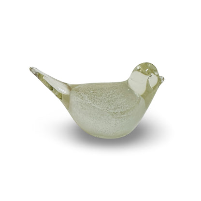 Single glass bird in side view with clear head, white eye, and sharply tapered tail