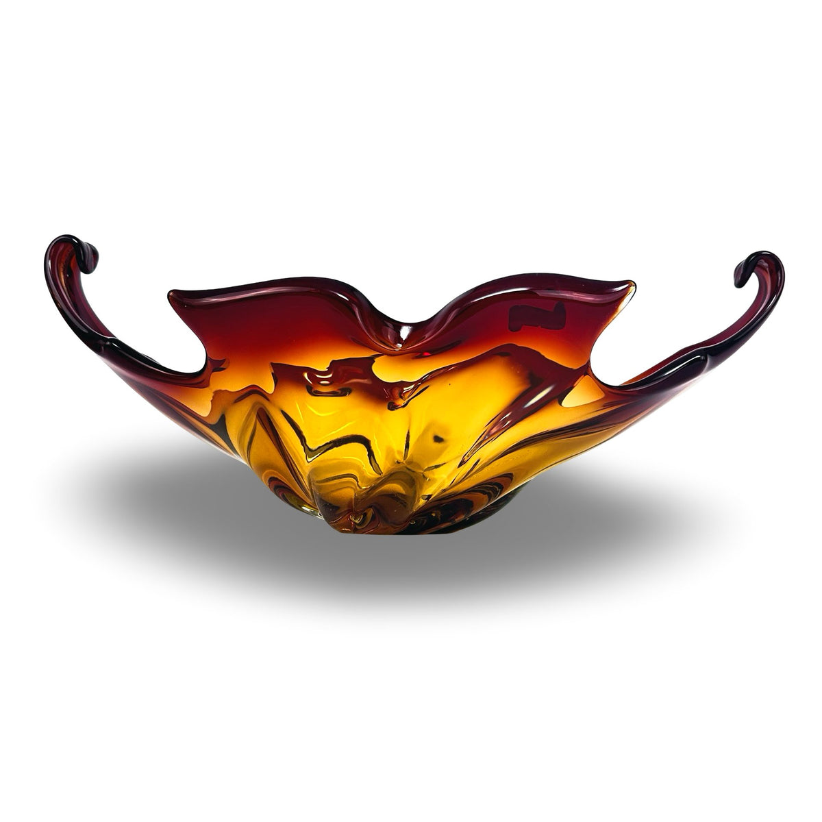 Mid-century Murano glass bowl in amber and red, front view at eye level