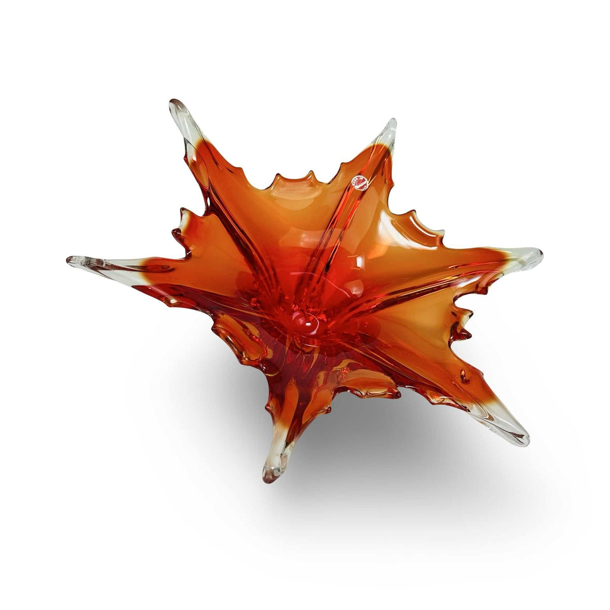 Murano Schale schräg von oben, orange leuchtender Innenraum mit roten Rippen in Sternform