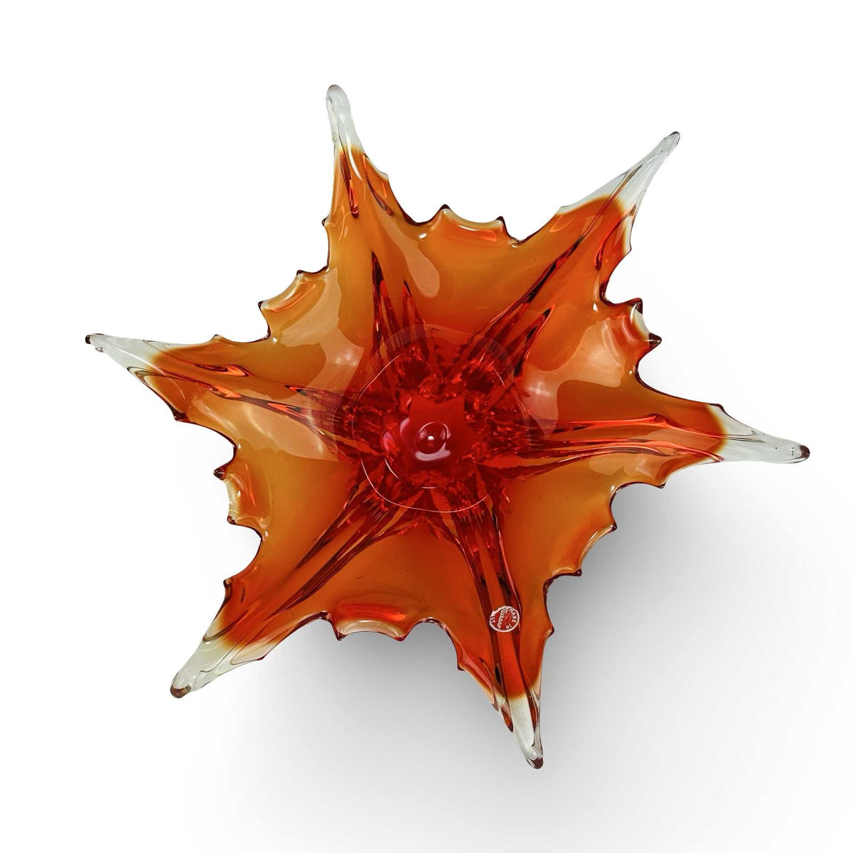 Draufsicht der sternförmigen Murano Sommerso Schale mit rotem Zentrum und Originaletikett