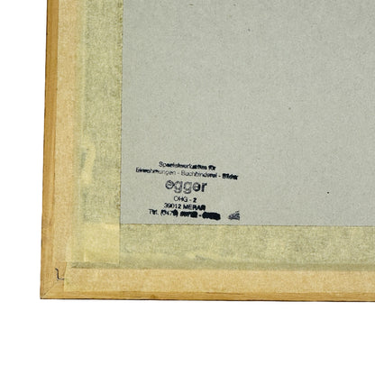Rückseite der Rahmung mit Stempel der Einrahmungswerkstatt Egger in Meran und Papierband