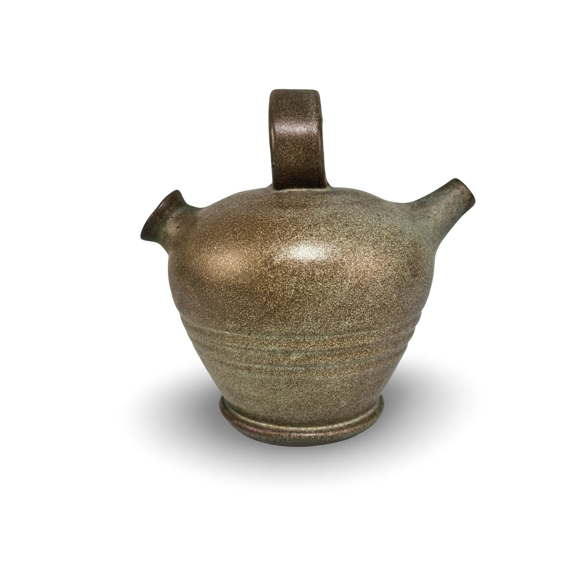 Vallauris gargoulette in side view with ring handle, filling opening and slender spout