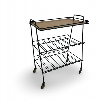 Black 1950s/60s wire trolley with handles, tray and brass castors, side angled view
