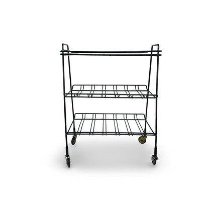 Front view of the black wire frame without tray, with two racks and brass castors
